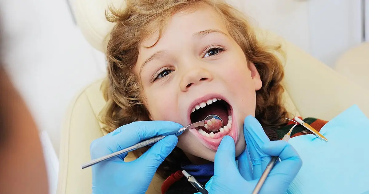 Quando devo ir pela primeira vez ao dentista?